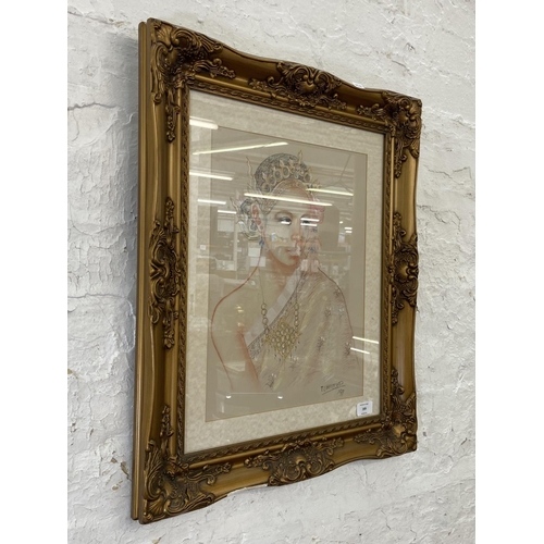 289 - A late 20th century gilt framed pastel portrait of an Oriental lady - approx. 63cm high x 53cm wide