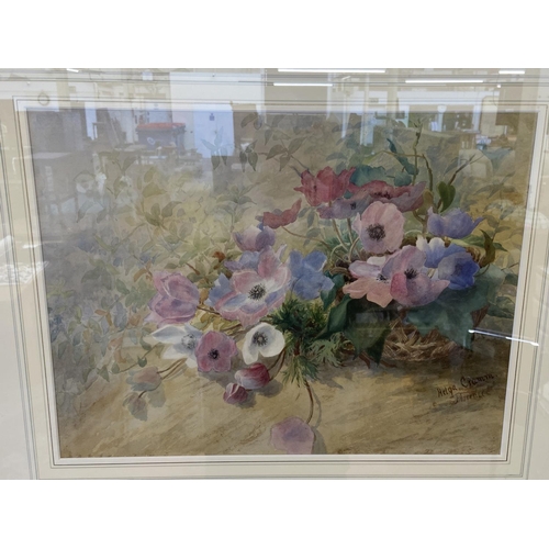 291 - A modern gilt framed watercolour of a still life floral scene signed lower right - approx. 65cm high... 