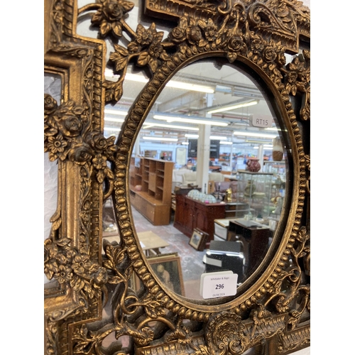 296 - A Rococo style gilt framed wall mirror - approx. 42cm high x 33cm wide