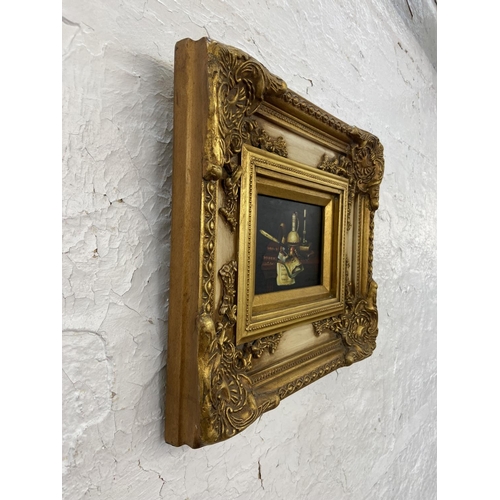 299 - A vintage gilt framed oil on board of a still life scene signed lower right - approx. 38cm high x 41... 