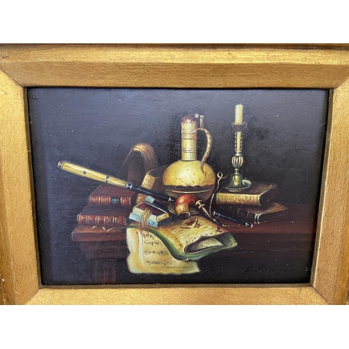 299 - A vintage gilt framed oil on board of a still life scene signed lower right - approx. 38cm high x 41... 