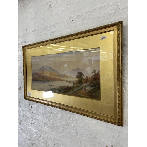 300 - An early 20th century gilt framed watercolour of a lakeside scene - approx. 42cm high x 73cm wide