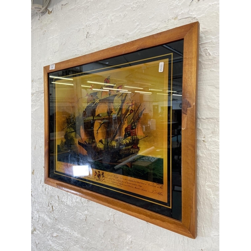 305 - A framed reverse glass print of a naval clipper ship - approx. 52cm high x 67cm wide