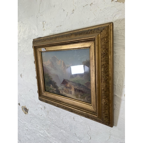 315 - An early 20th century gilt framed oil on board of a European mountain scene - approx. 32cm high x 37... 