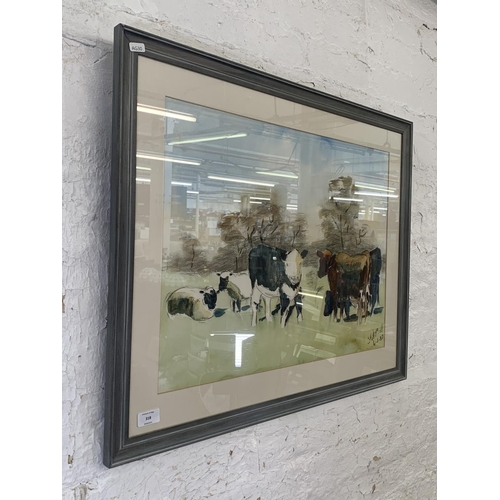 318 - A late 20th century Impressionist style F. A. Ball watercolour of cattle - approx. 65cm high x 80cm ... 