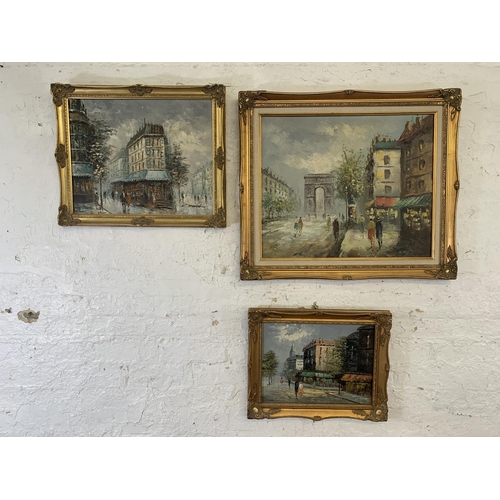 320A - Three 20th century gilt framed acrylic on canvas paintings of European street scenes - largest appro... 