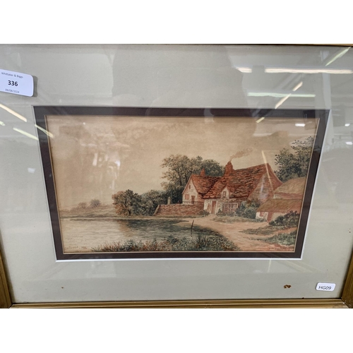 336 - Two early 20th century gilt framed watercolours of village scenes signed Eastwood - approx. 36cm hig... 