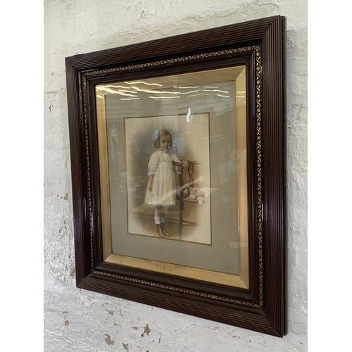 338 - A Victorian framed overpainted portrait of a young girl - approx. 79cm high x 70cm wide