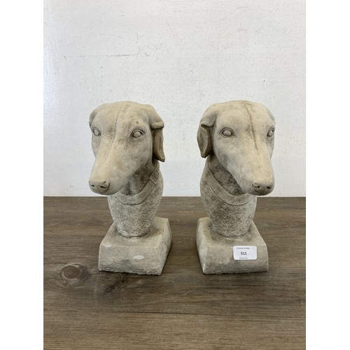 511 - A pair of cast concrete greyhound garden finials - approx. 27cm high