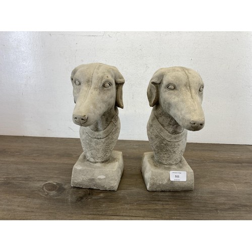 511 - A pair of cast concrete greyhound garden finials - approx. 27cm high