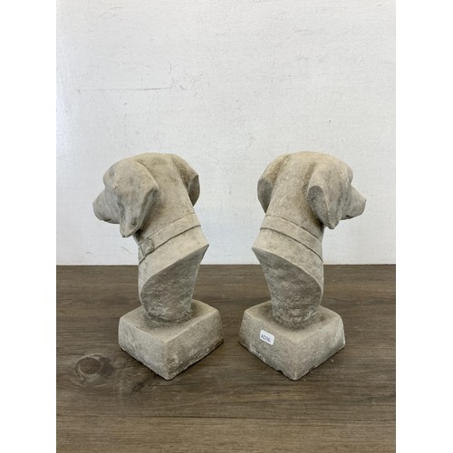 511 - A pair of cast concrete greyhound garden finials - approx. 27cm high