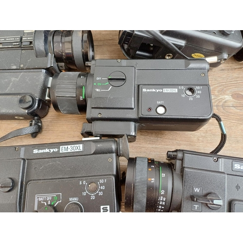 629 - A collection of cine cameras to include Sankyo Sound XL-40S, Sankyo EM-30XL, Chinon 872 Autozoom etc... 