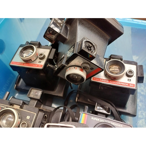 632 - Three boxes containing a large collection of Polaroid instant cameras to include boxed Image Elite, ... 