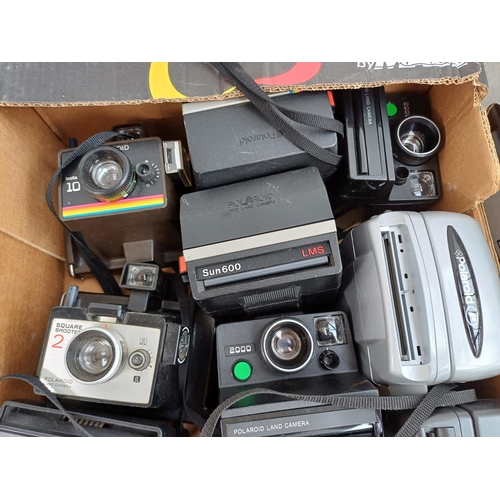 632 - Three boxes containing a large collection of Polaroid instant cameras to include boxed Image Elite, ... 