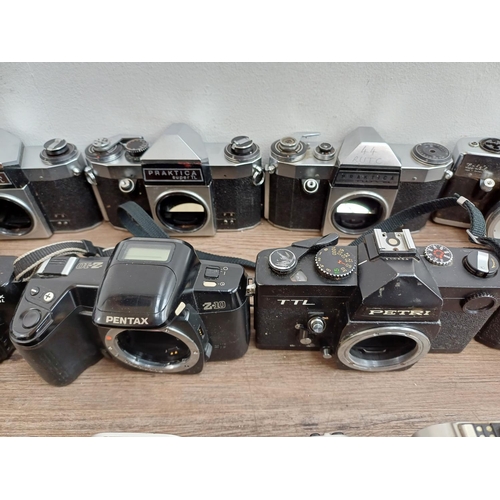 638 - Seventeen 35mm SLR camera bodies to include Ihagee Exa IIb, KMZ Zenit 12XP, Canon EOS 300, Petri TTL... 