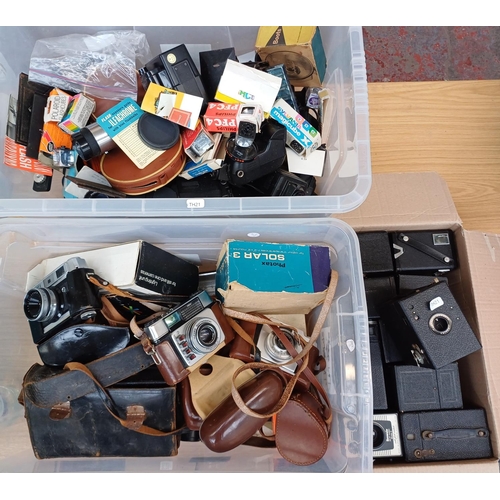 640 - Three boxes containing a large quantity of photography equipment, accessories and cameras to include... 