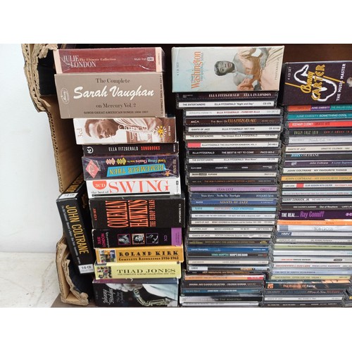 673 - Two boxes containing a collection of CD albums to include Johnny Hodges, Thad Jones, Roland Kirk, Co... 