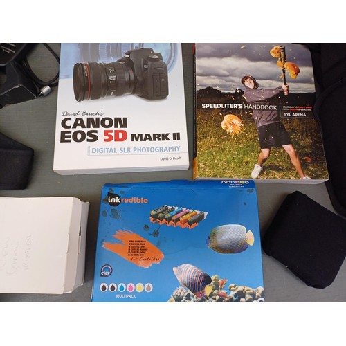 637 - A collection of photography equipment to include six good quality camera bags, Canon TC-80N3 timer r... 