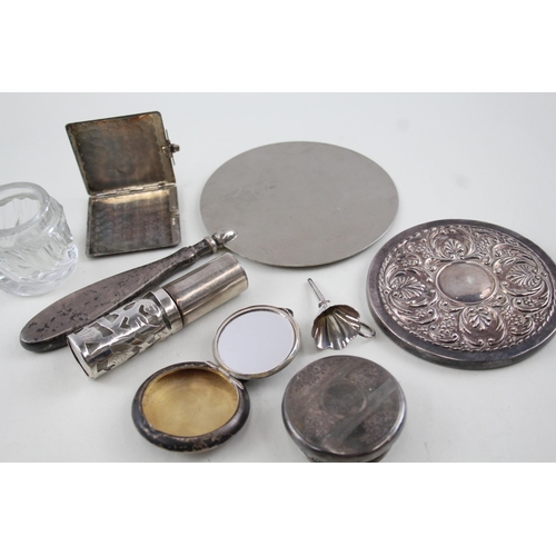 2189 - Seven hallmarked sterling silver items to include glass vanity jar, perfume bottle, compact mirror e... 