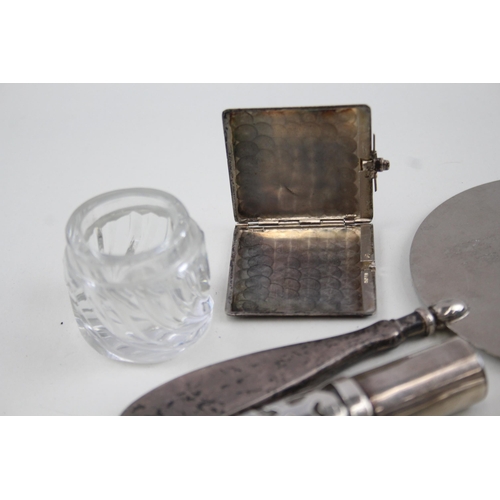 2189 - Seven hallmarked sterling silver items to include glass vanity jar, perfume bottle, compact mirror e... 