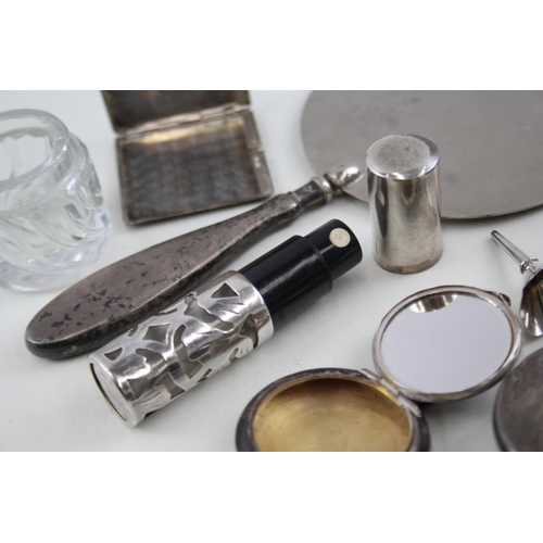 2189 - Seven hallmarked sterling silver items to include glass vanity jar, perfume bottle, compact mirror e... 