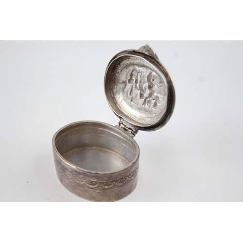 2193 - An .800 silver trinket box with cherub design - approx. gross weight 81g and 3cm high x 6.5cm wide x... 