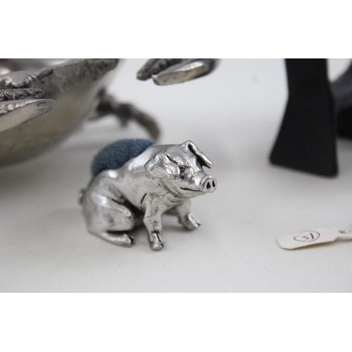 2201 - Five vintage novelty animal ornaments to include silver plated pig pin cushion etc.