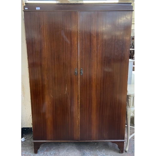 144 - A 1920s mahogany gentleman's compactum double wardrobe with fitted interior - approx. 181cm high x 1... 