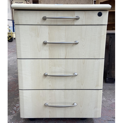 232 - A modern beech effect four drawer office filing cabinet - approx. 69cm high x 47cm wide x 50cm deep