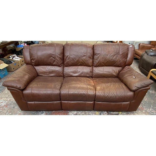 236 - A modern brown leather electric reclining three seater sofa