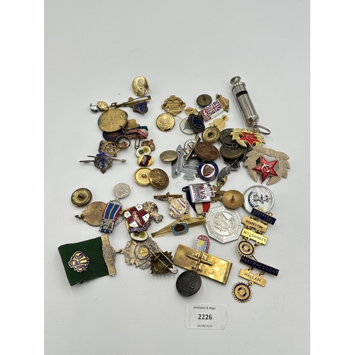 2226 - A collection of items to include two WVS Civil Defence badges, USSR badge, ROAB hallmarked sterling ... 