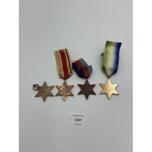 2237 - Four WWII medals, The Atlantic Star, The 1939-1945 Star, The Burma Star and The Pacific Star