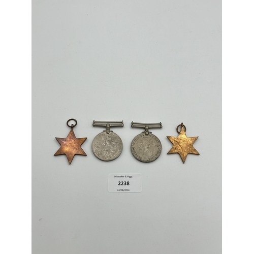 2238 - Four WWII medals, War, The Defence, The Italy Star and the 1939-1945 Star