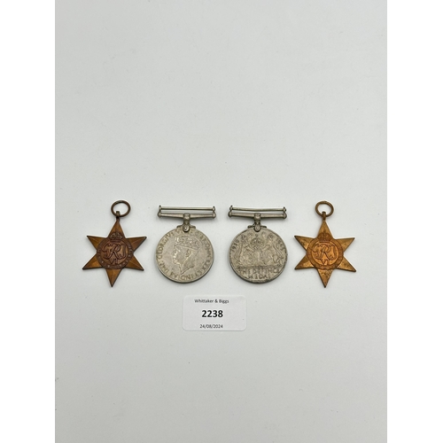 2238 - Four WWII medals, War, The Defence, The Italy Star and the 1939-1945 Star