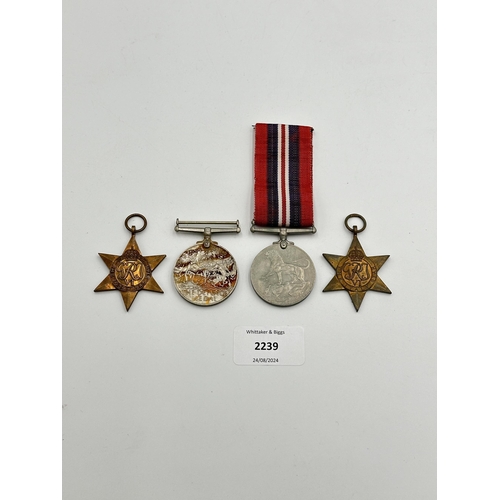 2239 - Four WWII medals, War, The Defence, The Italy Star and the 1939-1945 Star