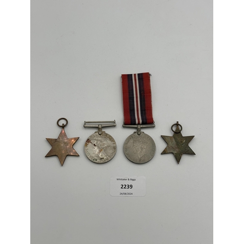 2239 - Four WWII medals, War, The Defence, The Italy Star and the 1939-1945 Star