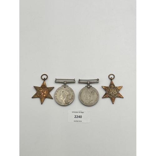 2240 - Four WWII medals, War, The Defence, The Italy Star and the 1939-1945 Star