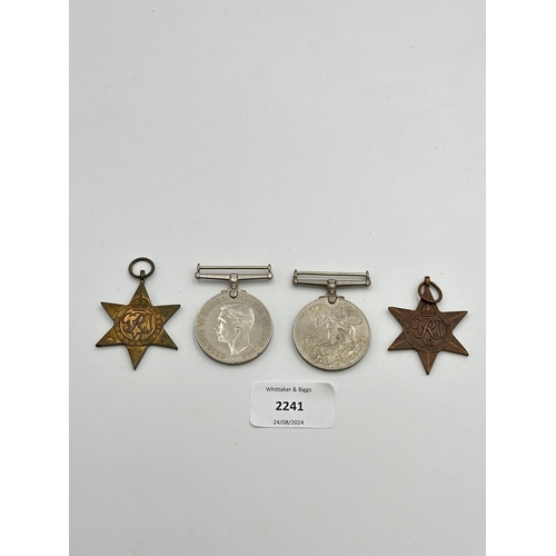 2241 - Four WWII medals, War, The Defence, The Italy Star and the 1939-1945 Star