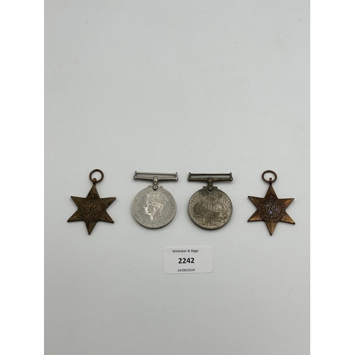 2242 - Four WWII medals, War, The Defence, The Italy Star and the 1939-1945 Star