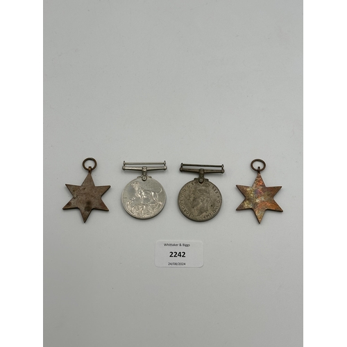 2242 - Four WWII medals, War, The Defence, The Italy Star and the 1939-1945 Star