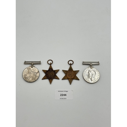 2244 - Four WWII medals, War, The Defence, The Italy Star and the 1939-1945 Star