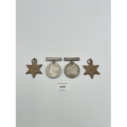 2249 - Four WWII medals, War, The Defence, The Italy Star and the 1939-1945 Star