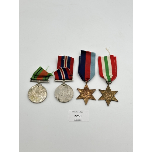 2250 - Four WWII medals, War, The Defence, The Italy Star and the 1939-1945 Star