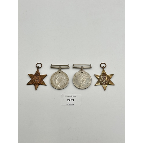 2253 - Four WWII medals, War, The Defence, The Italy Star and the 1939-1945 Star