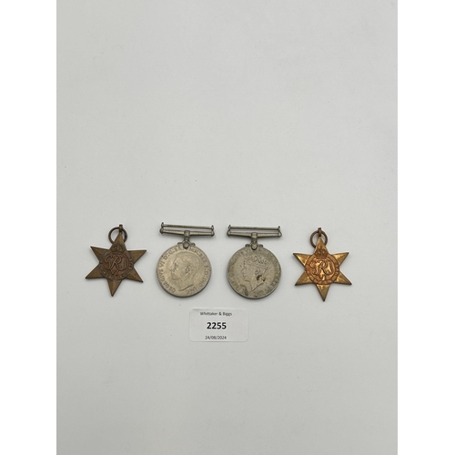 2255 - Four WWII medals, War, The Defence, The Italy Star and the 1939-1945 Star