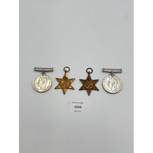 2256 - Four WWII medals, War, The Defence, The Italy Star and the 1939-1945 Star