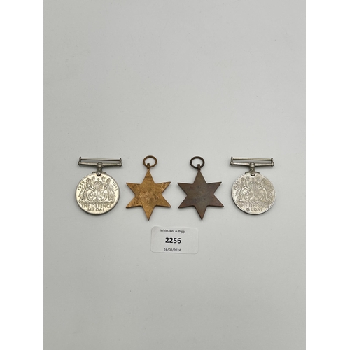 2256 - Four WWII medals, War, The Defence, The Italy Star and the 1939-1945 Star