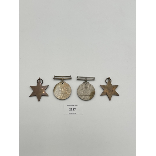 2257 - Four WWII medals, War, The Defence, The Italy Star and the 1939-1945 Star