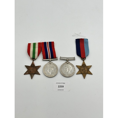 2258 - Four WWII medals, War, The Defence, The Italy Star and the 1939-1945 Star