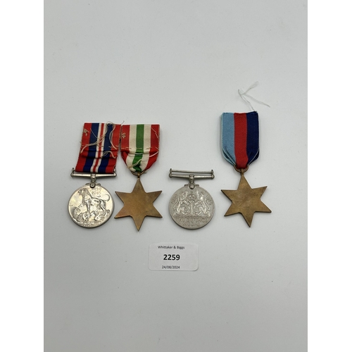 2259 - Four WWII medals, War, The Defence, The Italy Star and the 1939-1945 Star